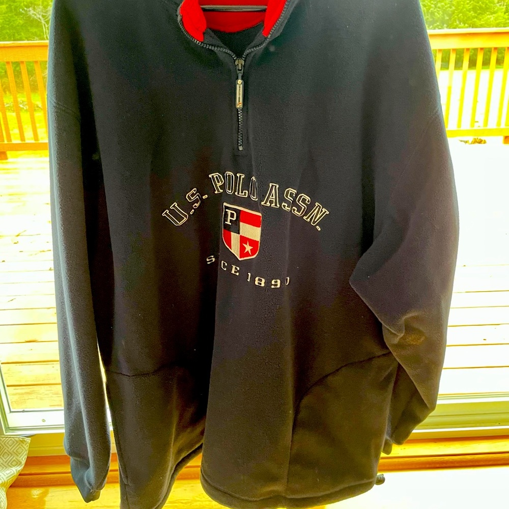Men’s black and red jacket.